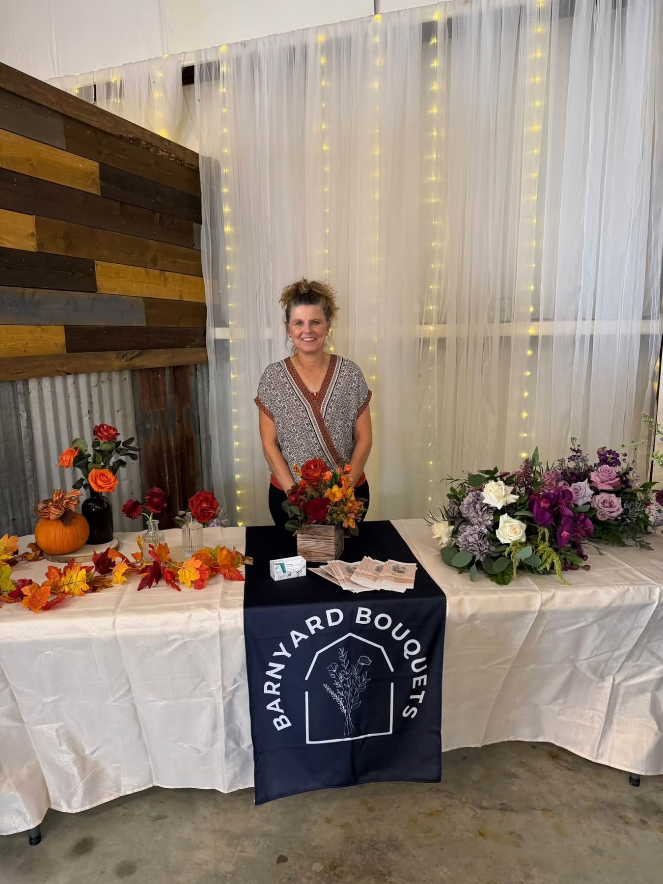 The Barnyard Bouquets floral booth at the Reverie at Diamond D Open House, October 2026
