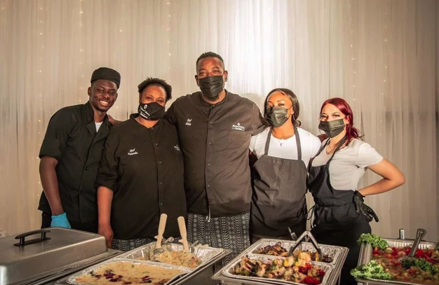 Catering team behind the chafing dish buffet at Bryanna's Sweet 16 at Reverie at Diamond D