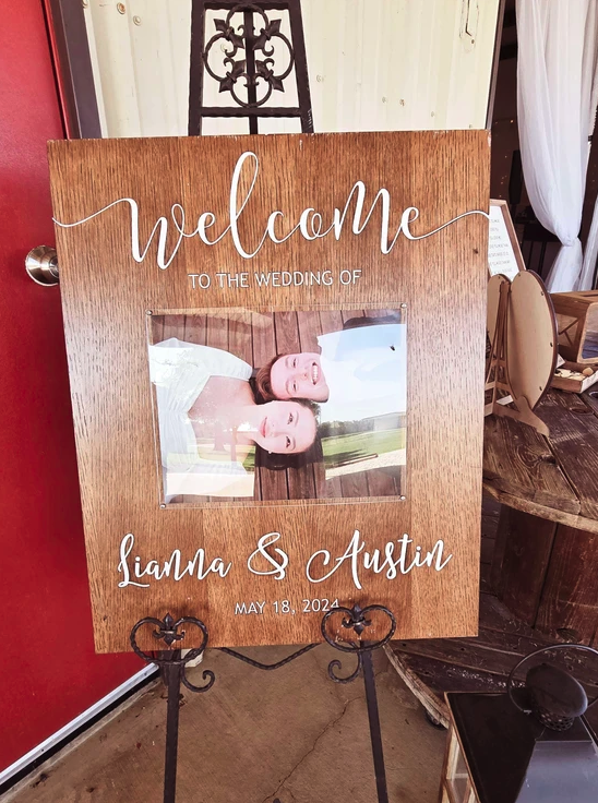 Wooden welcome sign for the May 18, 2024 wedding of Lianna and Austin at Reverie at Diamond D