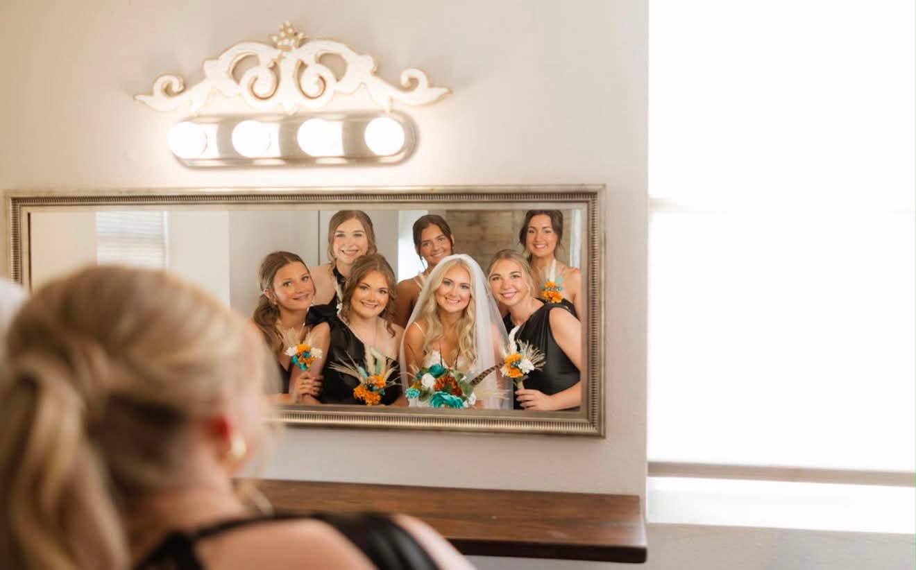 Wedding party celebrating at a Texas ranch wedding at Reverie at Diamond D