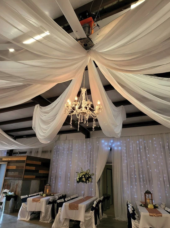 Draped barn set for a reception at Reverie at Diamond D near College Station, Texas