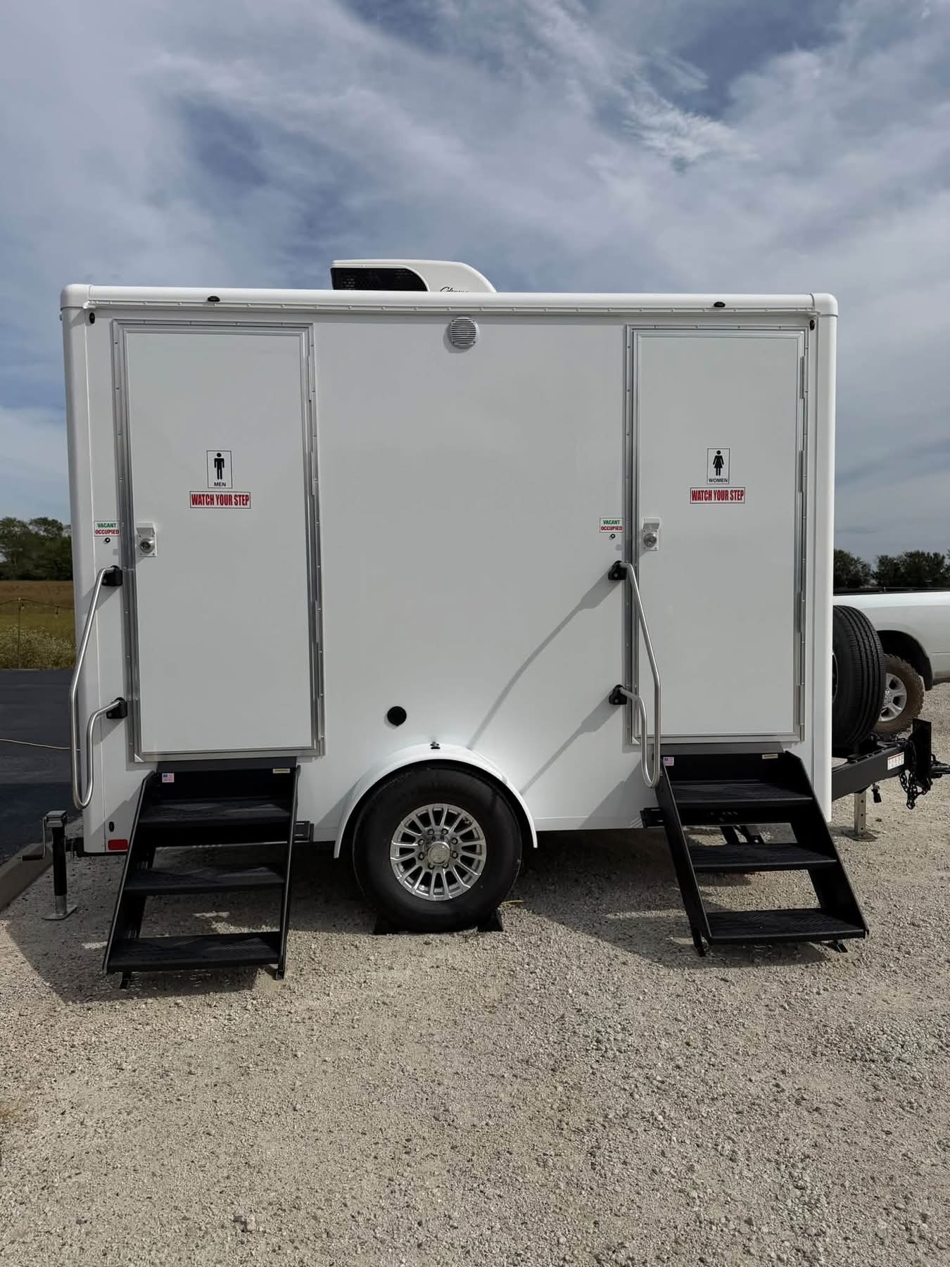 October 2026 Open House at Reverie at Diamond D wedding venue in Normangee, Texas — a luxury restroom trailer set up on the grounds