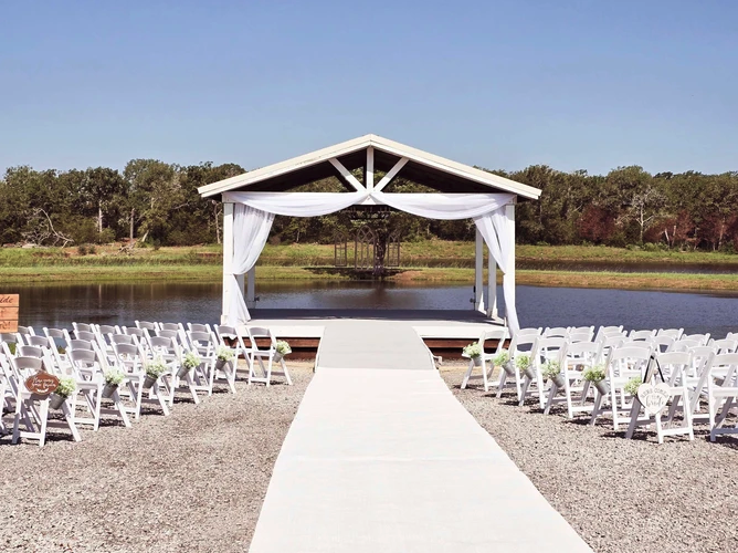 Lakeside covered pavilion ceremony site at Reverie at Diamond D near Bryan–College Station, Texas